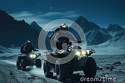 Adventurous riders traverse a chilly mountainous landscape at night, their ATVs illuminating the path under the serene moonlight. Stock Photo