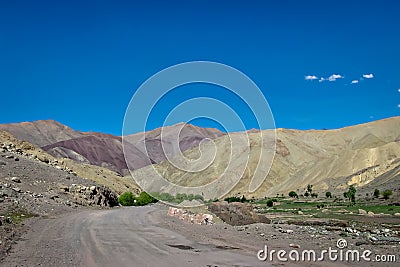 Adventurous road through mountains with clear blue sky on Manali to Leh highway in India Stock Photo