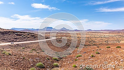 Adventurous road trip through a majestic landscape, Damaraland, Namibia. Stock Photo