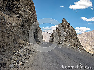 Adventurous road through Zoji La pass with clear blue sky on Manali to Leh highway in India Stock Photo