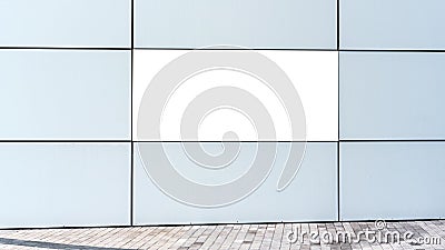 Advertisement banner located on commercial building wall Stock Photo