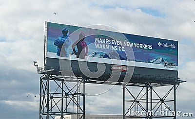 An advertisement billboard of Columbia Sportswear near the entrance of Lincoln Tunnel. Editorial Stock Photo