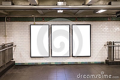 advertisement billboards electronic displays in a subway station in New York City. Stock Photo