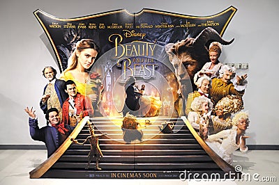 An advertisement display stand of the movie Beauty and the Beast Editorial Stock Photo