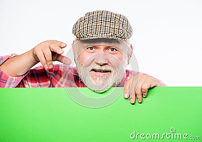 Advertisement shop. Senior bearded man place announcement on banner. job search. help. smiling mature man in retro hat Stock Photo