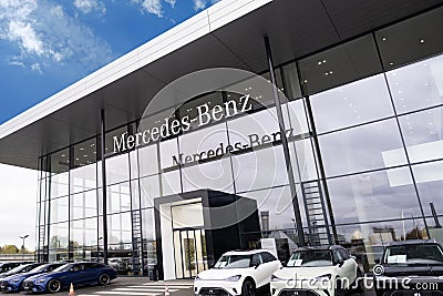 Advertising banners of Mercedes-Benz, Sales Office, emblem Daimler Motor, concept Advertising and Marketing in Automotive Industry Editorial Stock Photo