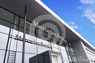 Advertising banners of Mercedes-Benz, Sales Office, emblem Daimler Motor, concept Advertising and Marketing in Automotive Industry Editorial Stock Photo