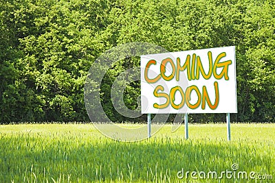 Advertising billboard with written `Coming Soon` on it Stock Photo