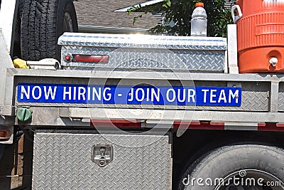 Truck sign advertising for workers Stock Photo