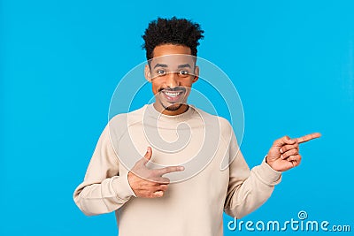 Advertising, technology and people concept. Modern hipster african american guy inviting join his company, telling about Stock Photo