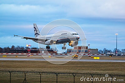 Aegan Airbus A320 landing in Prague Airport Editorial Stock Photo