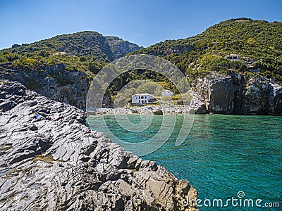 Aegean sea cliffs and a beautiful small basin like a private Jacuzzi. Stock Photo