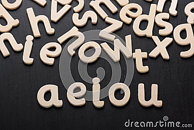 AEIOU Wooden Letters Stock Photo