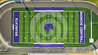 Aerial above Bearcats football field for Muncie Central High School on sunny summer day, IN Editorial Stock Photo