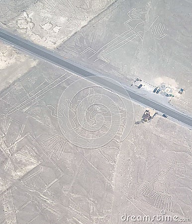 Aerial airplane panoramic view to Nazca geoglyph lines aka lizard, hands and tree, Ica, Peru Stock Photo