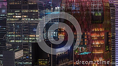 Aerial cityscape of Singapore downtown of modern architecture with skyscrapers night timelapse Editorial Stock Photo