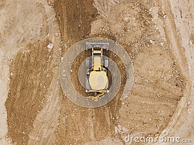 Aerial construction site with machinery, bulldozer, excavation. Top down view of city building site. Stock Photo
