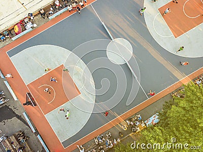 Aerial directly above view of street basketball court competition with the people playing Stock Photo