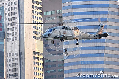 Aerial display of Skyhawk naval helicopter at NDP Editorial Stock Photo