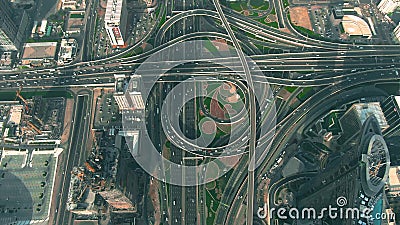 Aerial down view of a busy city highway interchange in Dubai Downtown, UAE Stock Photo