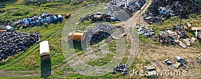 Aerial drone perspective view on car junkyard with old destroyed cars and old rusted parts waiting for recycling Stock Photo