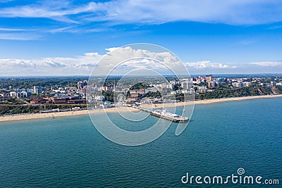 Aerial drone photo of the Bournemouth beach, Observation Wheel and Pier on a beautiful sunny summers day with lots of people Stock Photo