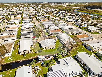 Aerial drone photo of mobile home trailer parks in Fort Myers FL which sustained damage from Hurricane Ian Stock Photo