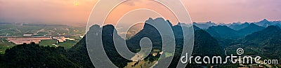Aerial drone photo - Mountains and lakes of northern Vietnam at sunset. Stock Photo