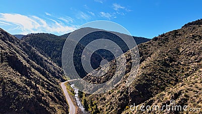 Aerial drone photo of river and highway in mountains in Colorado Stock Photo