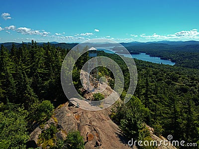 Aerial drone shot of firetower on the summit in the Adirondack Mountains Stock Photo