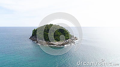 Aerial drone shot of Ko Pu desert island with palm trees and wild nature surrounded by turquoise sea water in Phuket, Thailand Stock Photo