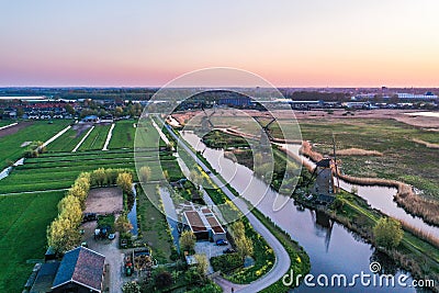 Aerial drone shot view of Kinderdijk Wind Mills in the filed near Rotterdam in Netherlands Stock Photo