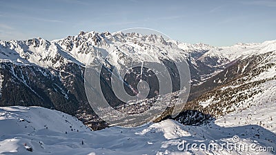 Aerial drone view of Chamonix city at the foot of snowy mountain Brevent Stock Photo