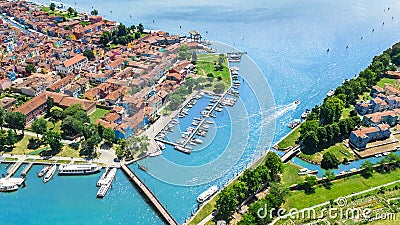 Aerial view of colorful Burano island in Venetian lagoon sea from above, Italy Stock Photo