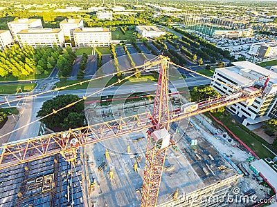 Aerial drone view of Construction crane building new skyscrapers in Austin Texas Editorial Stock Photo