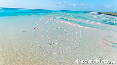 Aerial drone view of kite surfing lovers enjoying the sea in Jambiani Zanzibar Stock Photo