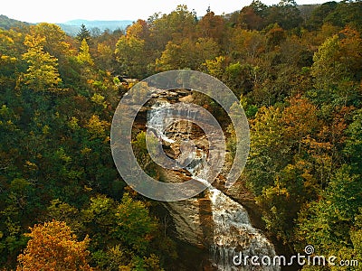 Aerial Drone view of overhead colorful fall / autumn leaf foliage near Asheville, North Carolina.Vibrant red, yellow, teal, orange Stock Photo