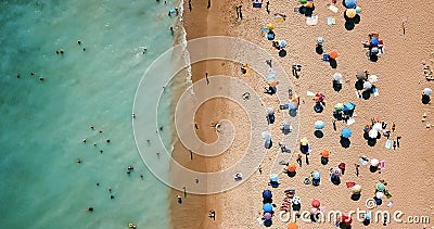 Aerial Drone View Of People On Beach In Portugal Stock Photo