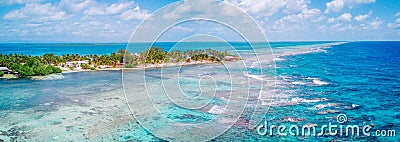 Aerial Drone view of South Water Caye tropical island in Belize barrier reef Stock Photo