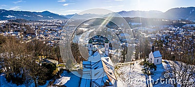 Aerial of the famous kalvarienberg church in bad toelz snow covered alps and isar river in the back Stock Photo