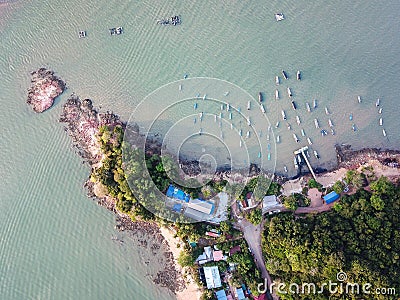 Aerial fishing village near the rock sand coastal Stock Photo