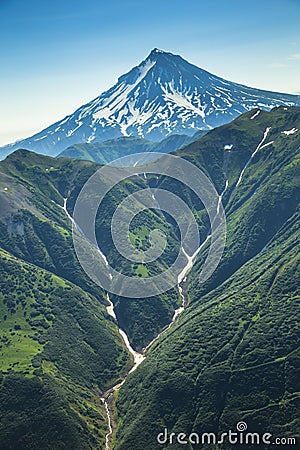 Aerial flight breathtaking view of Kamchatka the land of volcanos and green valleys Stock Photo