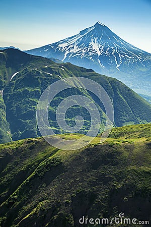 Aerial flight with view of Kamchatka the land of volcanos and green valleys Stock Photo