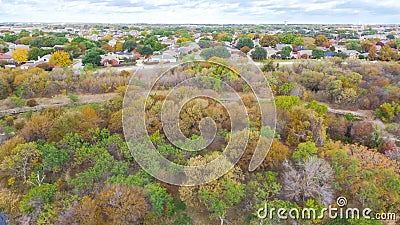 Aerial forest view residential subdivision and bright beautiful fall foliages colors suburbs Dallas, Texas, USA Stock Photo