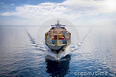 Aerial front view of a loaded container cargo vessel Stock Photo