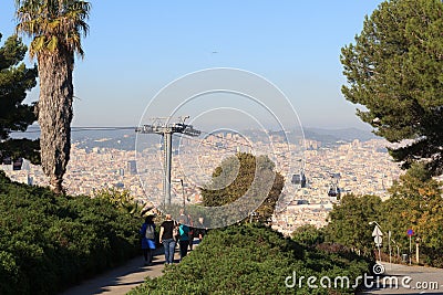 Aerial gondola lift with cable car and Barcelona cityscape panorama seen from Montjuic Editorial Stock Photo