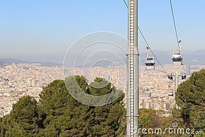 Aerial gondola lift with cable car and Barcelona cityscape panorama seen from Montjuic, Spain Stock Photo