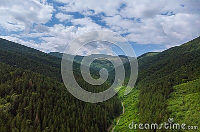Aerial View Green Grass Summer Mountain In Mountains. View of Carpathians Mountains In Drone Aerial View Stock Photo