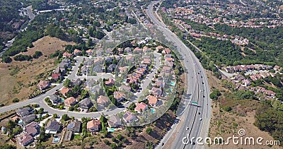 Aerial of houses and highway in suburbs of san mateo county, sf bay area california, USA