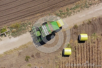 Aerial image of a Large Cotton picker harvesting a field. Editorial Stock Photo